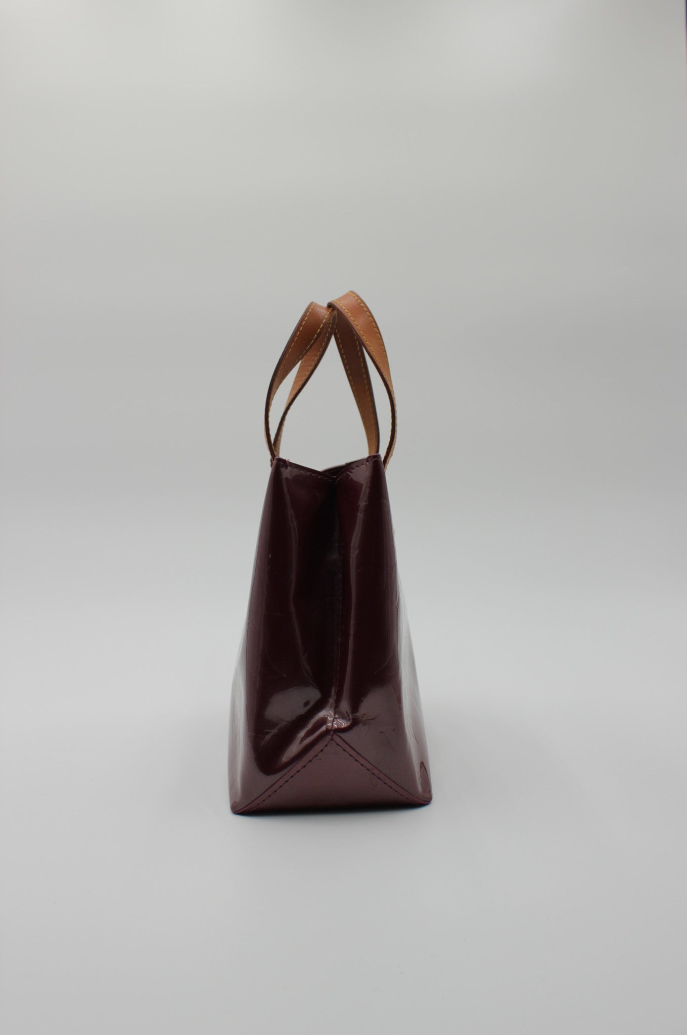 Monogram Vernis Reade PM